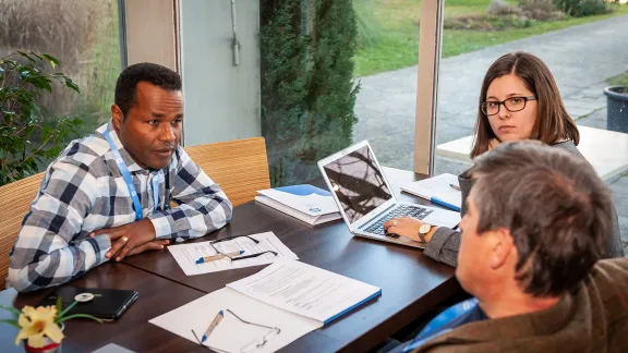 Rev. Dr Bruk Ayele in conversation with other members of an Advisory Group on the launching of the LWF’s Theological Education and Formation (TEF) network. Photo: LWF/S. Gallay