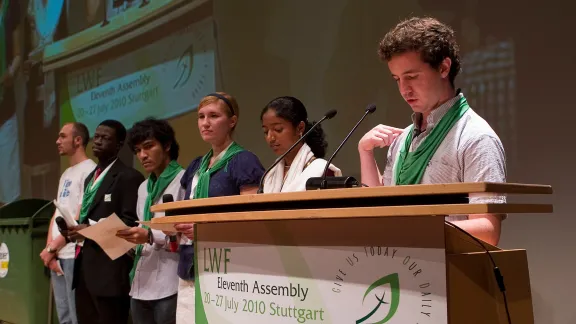 Stewards speak to the plenary at the LWF Eleventh Assembly in Germany. Photo: LWF/Erick Coll.