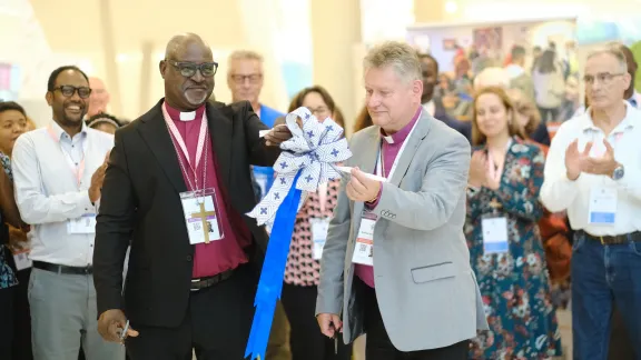 LWF President Archbishop Dr Panti Filibus Musa and Bishop Jerzy Samiec from the Evangelical Church Of The Augsburg Confession In Poland pictured as they officially open the Assembly Jarmark, a marketplace for ideas and partnerships. Photo: LWF/Marie Renaux