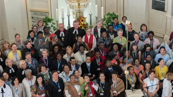 Participants of the Women’s Pre-Assembly in Wrocław, Poland, after the opening worship. Photo: LWF/Albin Hillert 